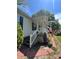 Charming home with a covered porch, brick trim, and an American flag on display at 515 Willow St, Lincolnton, NC 28092