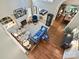 Open living room with wood floors, fireplace, and multiple seating areas, perfect for entertaining at 5603 Ballinard Ln, Charlotte, NC 28277