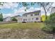 Spacious backyard featuring a deck with a pergola, offering an ideal setting for outdoor enjoyment and relaxation at 5745 Snapdragon Ln, Huntersville, NC 28078