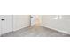 Bedroom featuring new carpet, base trim, neutral walls and a bright doorway at 5745 Snapdragon Ln, Huntersville, NC 28078