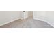Neutral bedroom featuring new carpet, base trim and a bright doorway at 5745 Snapdragon Ln, Huntersville, NC 28078