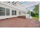 Large wooden deck with white pergola, ideal for outdoor gatherings and relaxation, with backyard views at 5745 Snapdragon Ln, Huntersville, NC 28078