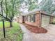 Lovely brick home with an attached garage and manicured landscaping at 6231 Kentwood Dr, Kannapolis, NC 28081