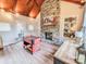 Game room area with foosball table, stone fireplace, and built-in shelves at 6231 Kentwood Dr, Kannapolis, NC 28081