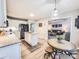 Open kitchen with granite countertops, an island and an adjacent dining area at 6231 Kentwood Dr, Kannapolis, NC 28081