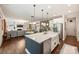 Open concept kitchen features an island with a sink, and is open to the living room at 6618 Vizcaya Ct, Charlotte, NC 28226