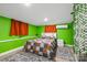 Vibrant bedroom with a cozy bed, colorful accents, and bright green walls creating a lively atmosphere at 715 Potneck Rd, Salisbury, NC 28147