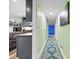 Hallway leading to a blue accent wall, features mint walls and rug, open to kitchen at 715 Potneck Rd, Salisbury, NC 28147