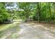 Large property with a trampoline, RV, hammock, shed and multiple seating areas at 715 Potneck Rd, Salisbury, NC 28147