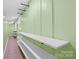 This storage room has built in shelving with light green siding, perfect for organization at 715 Potneck Rd, Salisbury, NC 28147