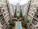Breathtaking aerial view showcases a community pool and beautifully landscaped courtyard at 718 W Trade St # 704, Charlotte, NC 28202