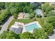 Aerial view of community amenities, including the pool, playground, and sports courts at 7525 Blackgum Falls Ct, Huntersville, NC 28078