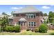 Spacious brick home featuring a well-maintained backyard at 7525 Blackgum Falls Ct, Huntersville, NC 28078