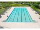 Relax in the sunshine at the community's large outdoor swimming pool at 7525 Blackgum Falls Ct, Huntersville, NC 28078