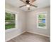 Bright bedroom with two windows and a ceiling fan at 814 Marve St, Gastonia, NC 28052