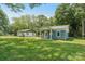 Charming home with a lush green lawn and mature trees at 814 Marve St, Gastonia, NC 28052
