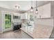 Bright kitchen features stainless steel appliances, granite countertops, subway tile backsplash, and pendant lighting at 814 Marve St, Gastonia, NC 28052