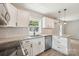 Updated kitchen features granite counters, stainless appliances, and ample storage at 814 Marve St, Gastonia, NC 28052