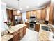 Spacious kitchen with an island, stainless steel appliances, and granite countertops at 8218 Lynnewood Glen Dr, Charlotte, NC 28269