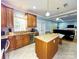 Open concept kitchen with granite counters, stainless steel appliances, and view to living room at 8218 Lynnewood Glen Dr, Charlotte, NC 28269