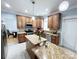 Kitchen features an island, stainless steel appliances, granite countertops, and open layout at 8218 Lynnewood Glen Dr, Charlotte, NC 28269