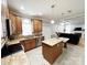 Well-equipped kitchen with an island, granite countertops, and stainless steel appliances at 8218 Lynnewood Glen Dr, Charlotte, NC 28269