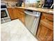 Modern kitchen featuring a stainless steel dishwasher and ample cabinet space at 8218 Lynnewood Glen Dr, Charlotte, NC 28269