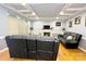 Cozy living room featuring a decorative ceiling and plush seating at 8218 Lynnewood Glen Dr, Charlotte, NC 28269