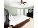 Main bedroom featuring a tray ceiling, carpet, and en-suite bathroom at 8218 Lynnewood Glen Dr, Charlotte, NC 28269