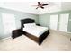 Primary bedroom with tray ceiling, carpet flooring, and neutral paint at 8218 Lynnewood Glen Dr, Charlotte, NC 28269