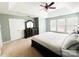 Comfortable bedroom with carpet flooring, fan, and natural light at 8218 Lynnewood Glen Dr, Charlotte, NC 28269