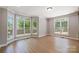 Spacious bonus room featuring large windows and natural light at 8707 Fairview Rd, Charlotte, NC 28226