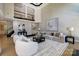 Bright and airy living room with high ceilings, large windows, and stylish contemporary furnishings at 8707 Fairview Rd, Charlotte, NC 28226