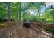 A spacious back deck features a built-in grill, perfect for outdoor entertaining and relaxation at 9002 Maple Hill Ct, Huntersville, NC 28078