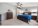 Primary bedroom featuring neutral paint, a ceiling fan, and natural light at 9002 Maple Hill Ct, Huntersville, NC 28078