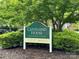 Entrance to Cleveland House Assisted Living with lush green landscaping and visible signage at 951 Hardin Dr, Shelby, NC 28150