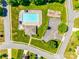 Aerial view of neighborhood amenities including swimming pool, splash pool, playground and parking at 9700 Stewart Spring Ln, Charlotte, NC 28216