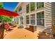 Large back deck with seating and grill perfect for outdoor entertaining and relaxation at 9700 Stewart Spring Ln, Charlotte, NC 28216