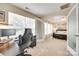 View from the office to the main bedroom featuring an arched doorway at 9700 Stewart Spring Ln, Charlotte, NC 28216