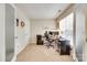 Comfortable office featuring a large desk, ergonomic chair, and natural light at 9700 Stewart Spring Ln, Charlotte, NC 28216