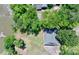 Aerial view of the home nestled amongst mature trees and situated on the lake at 993 Jackson Rd, Fort Lawn, SC 29714