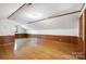 Bonus room with wood floors and wainscoting at 993 Jackson Rd, Fort Lawn, SC 29714