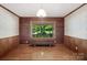 Bright dining room with hardwood floors, vintage wallpaper, and a window view at 993 Jackson Rd, Fort Lawn, SC 29714