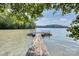 Dock with a view of calm lake waters and lush greenery, perfect for enjoying waterfront living at 993 Jackson Rd, Fort Lawn, SC 29714
