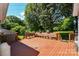 Expansive back deck perfect for entertaining with built in benches and scenic views at 1004 Midwood Dr, Monroe, NC 28112