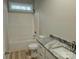Inviting bathroom featuring a shower-tub combination and a stylish granite-topped vanity with modern fixtures at 107 Skyland Dr, Mount Gilead, NC 27306