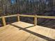 Spacious wood deck with stylish cable railing, perfect for outdoor enjoyment at 107 Skyland Dr, Mount Gilead, NC 27306