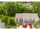 An aerial view of the home, showcasing the professionally landscaped lawn and community at 1161 Stuarts Landing Dr, Cramerton, NC 28032