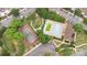Aerial view of community amenities featuring a swimming pool, tennis court, and green spaces at 11707 Ridgeway Park Dr, Charlotte, NC 28277