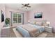 Comfortable bedroom with neutral tones, ample natural light, and plush furnishings at 11707 Ridgeway Park Dr, Charlotte, NC 28277